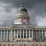 "Map of Utah highlighting the current four congressional districts and the division of Salt Lake County."