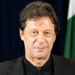 Imran Khan, in a suit, stands in a courtroom as Pakistan’s Supreme Court grants him bail in May 9 violence cases