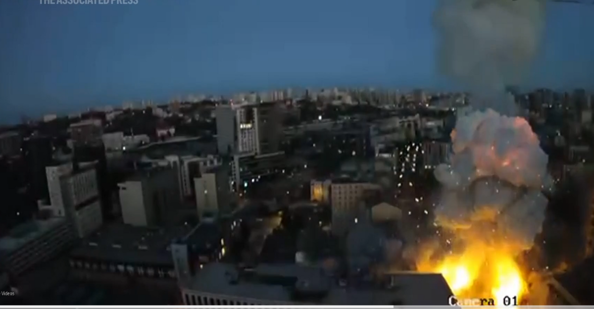 Ukrainian rescue teams searching rubble after missile strike