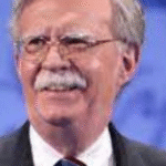 FBI agents outside John Bolton’s Maryland home during a dawn raid on August 22, 2025